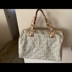 Michael’s Kors hand bag.